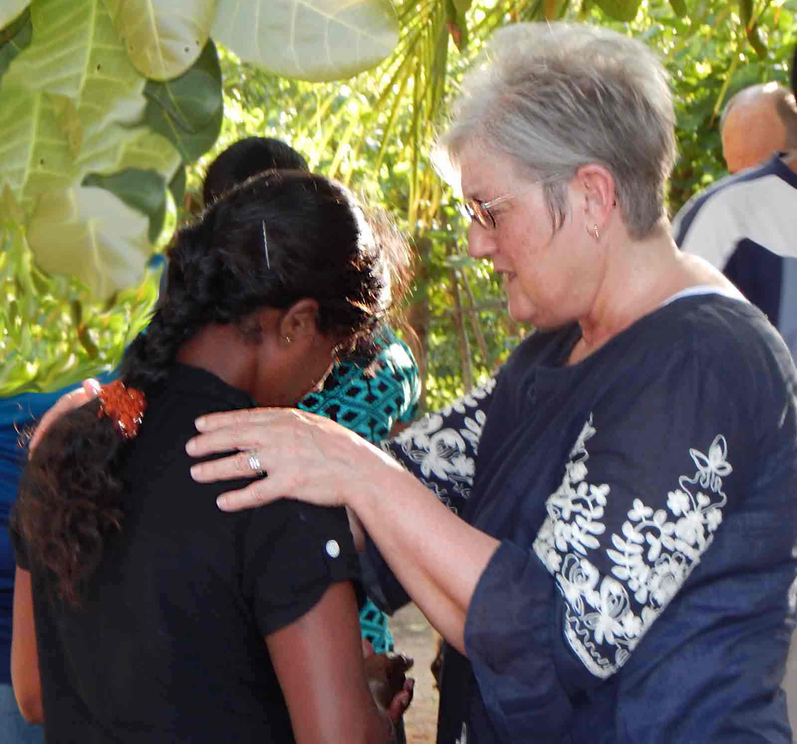 VOM staff members encourage Sri Lankan Christians.