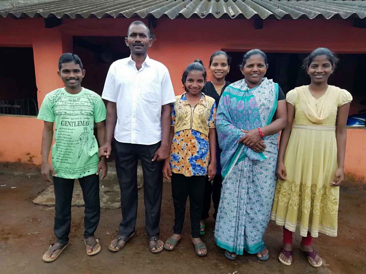 Bijaya, second from the left, was reunited with his wife and children after more than 10 years.