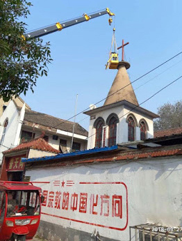 Last year, government workers removed crosses from the tops of churches in Henan.