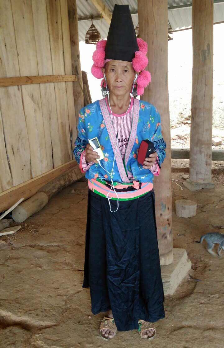 A Hmong woman who received an audio Bible.