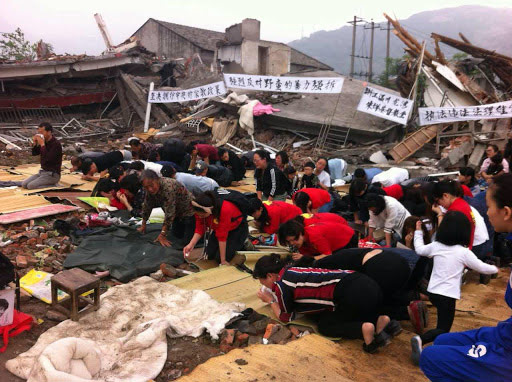 Christians worship in the rubble of a destroyed church. (Photo: China Aid)