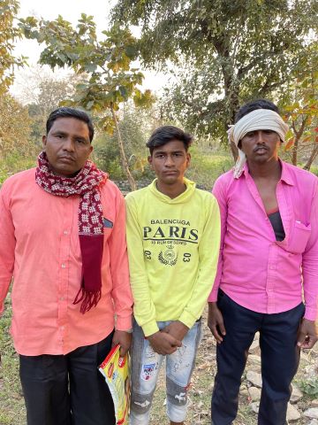 Pastor Nahtiya (left) and the two men injured in the attack