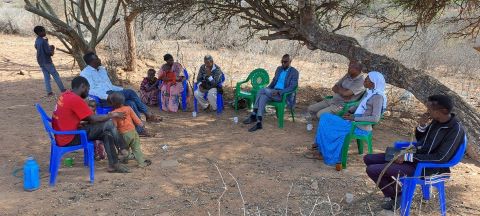 Christians meet under a tree