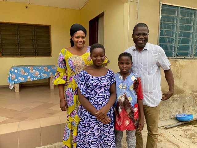 Pastor Tchando, his wife and two of their children.