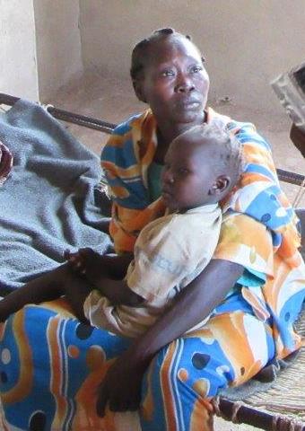 A mother and child in Sudan who received aid.